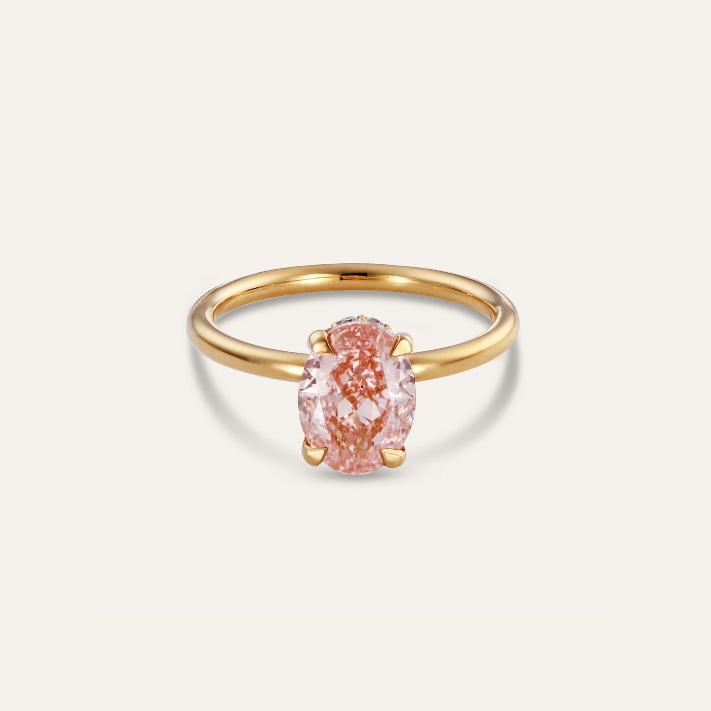 Oval pink engagement ring with hidden halo (2.26 ct)