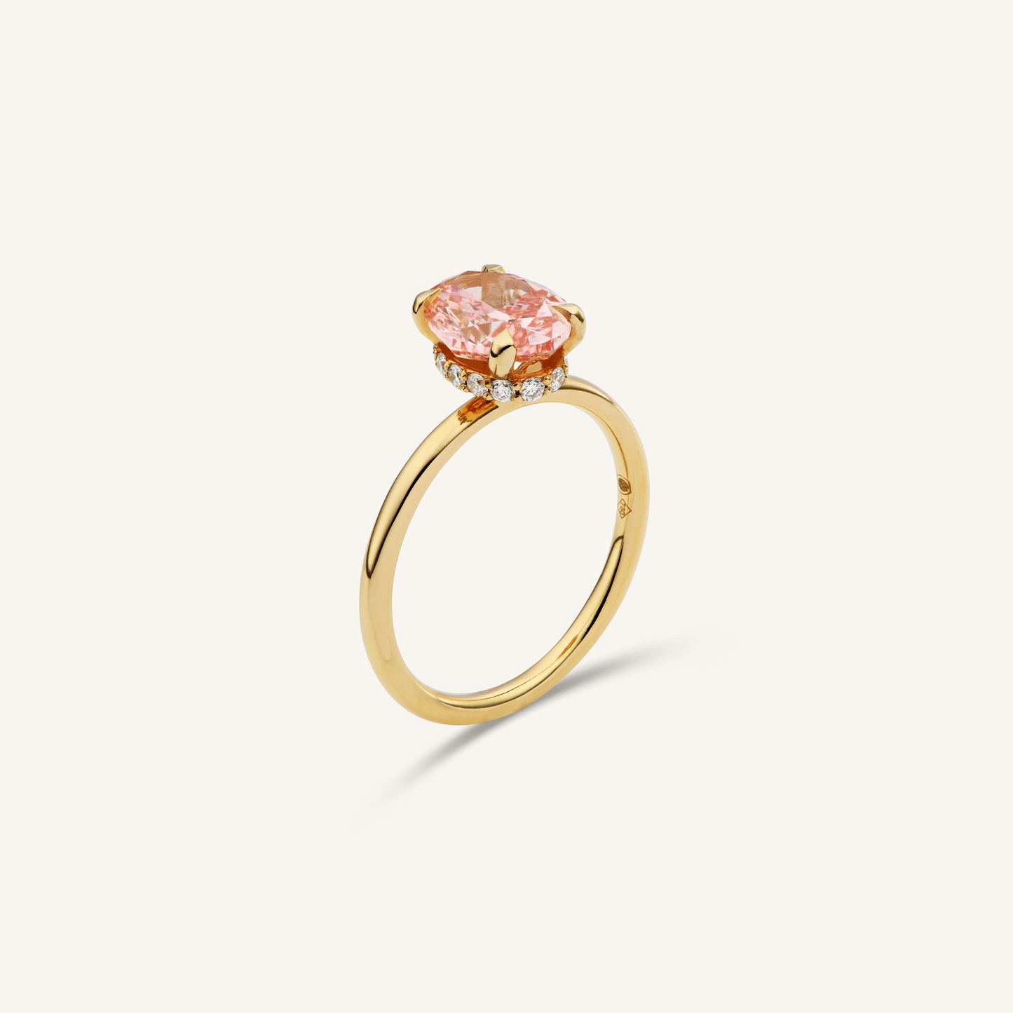 Oval pink engagement ring with hidden halo (2.26 ct)