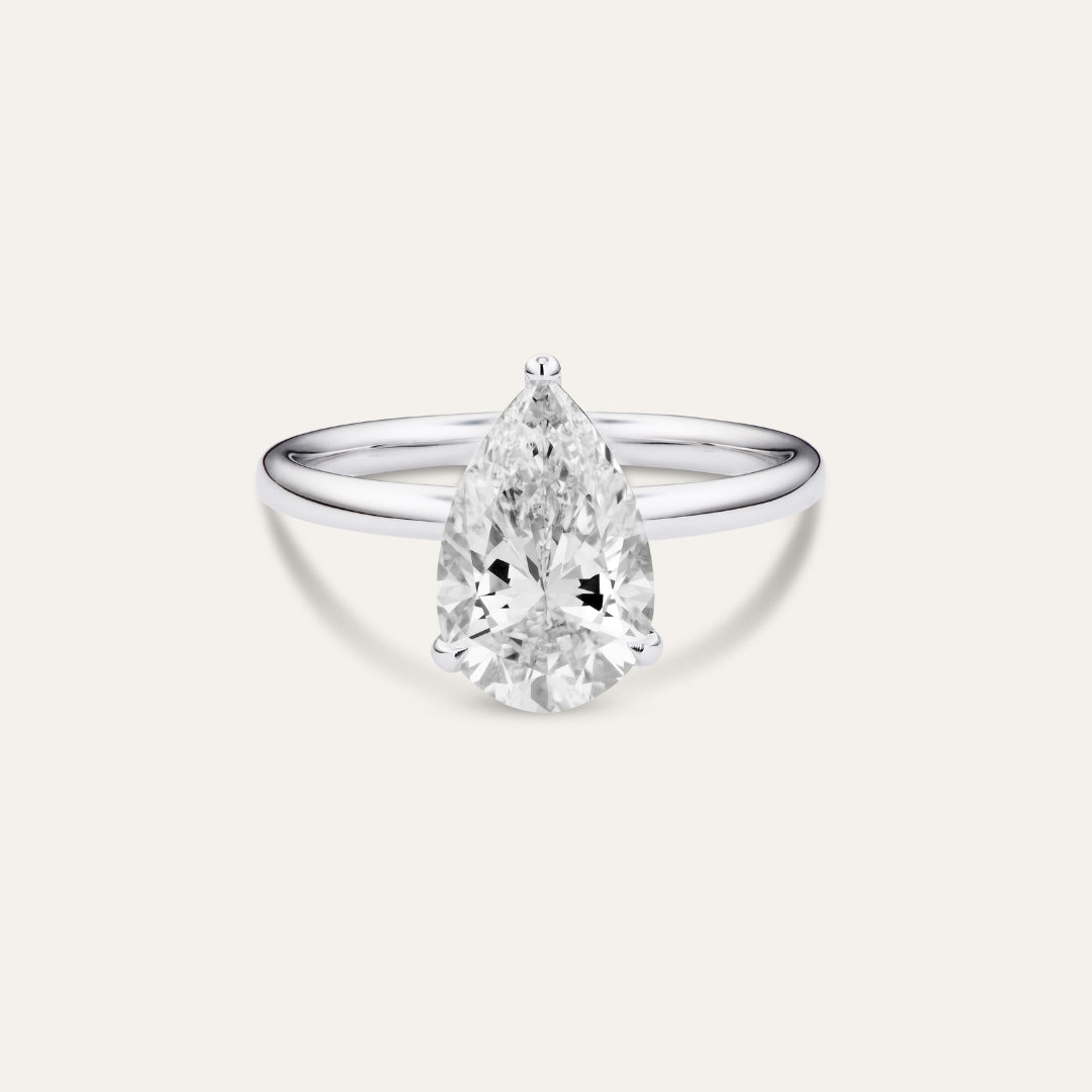 Classic pear-shaped engagement ring with hidden halo (2.59ct)