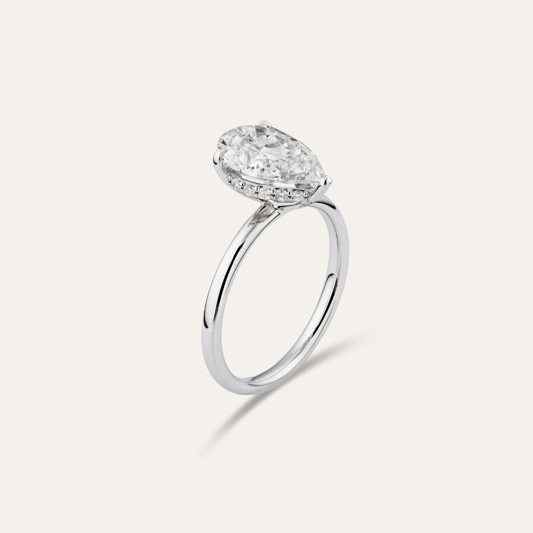 Classic pear-shaped engagement ring with hidden halo (2.59ct)