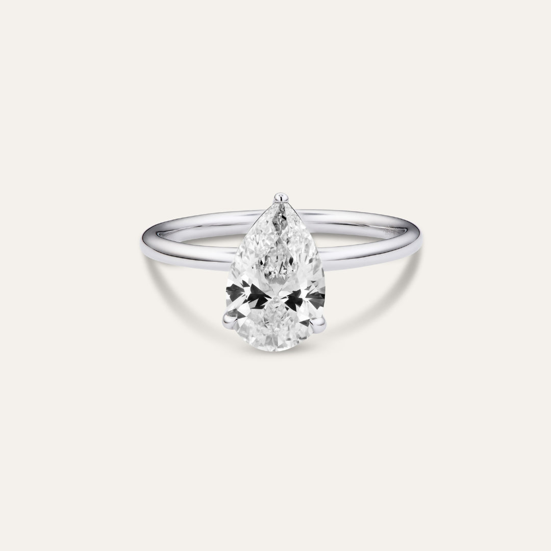 Classic pear-shaped engagement ring with hidden halo (2.01 ct)