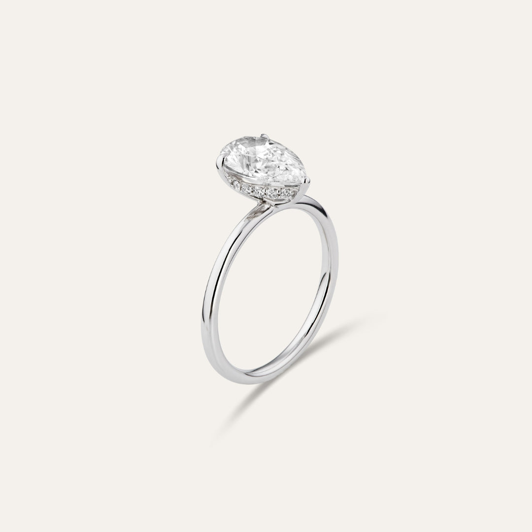 Classic pear-shaped engagement ring with hidden halo (2.01 ct)