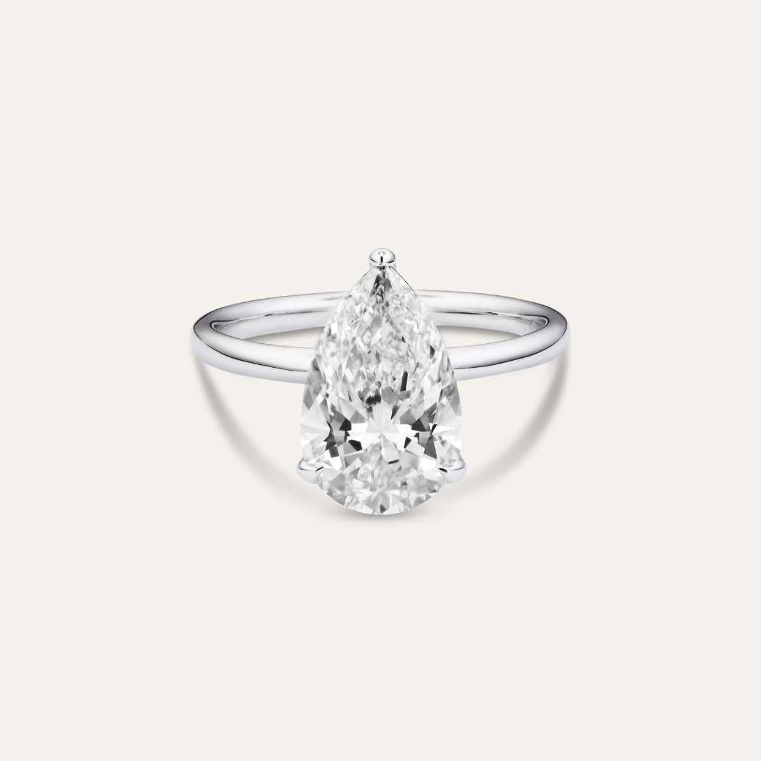 Classic pear-shaped engagement ring with hidden halo (3.52ct)