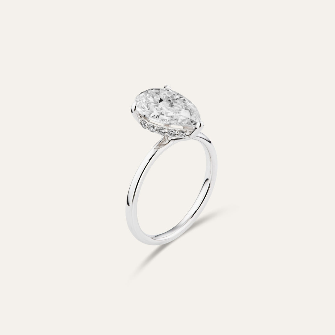 Classic pear-shaped engagement ring with hidden halo (3.52ct)