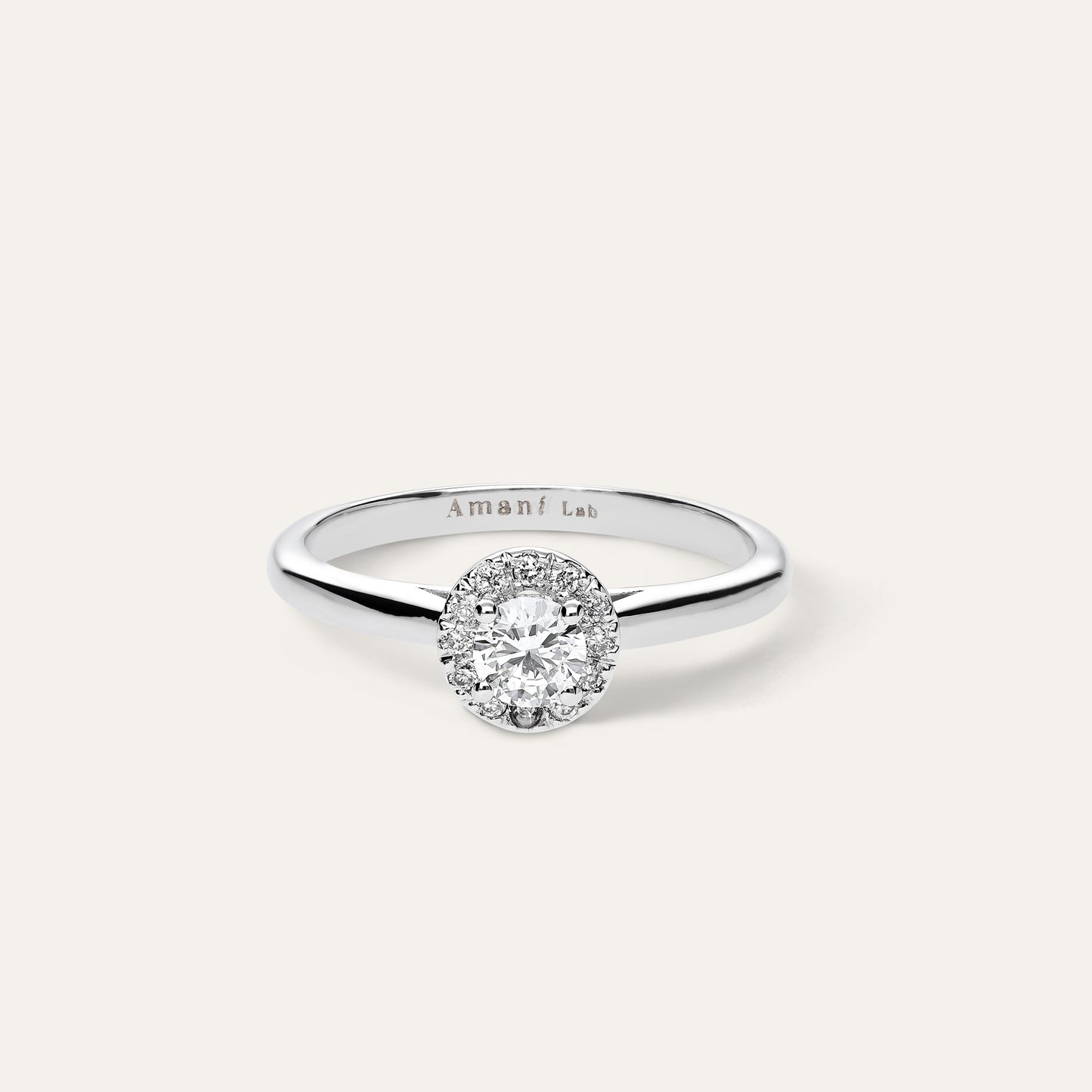 Classic round engagement ring with halo (0.31 ct)