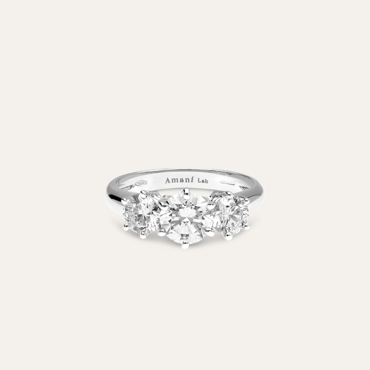 Classic trilogy engagement ring (1.1 ct center & 1.0 ct tot sides)