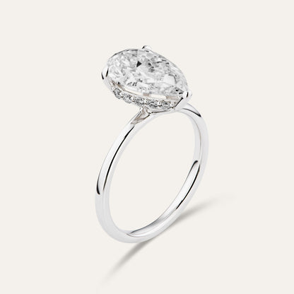 Classic pear-shaped engagement ring with hidden halo (3.52ct)