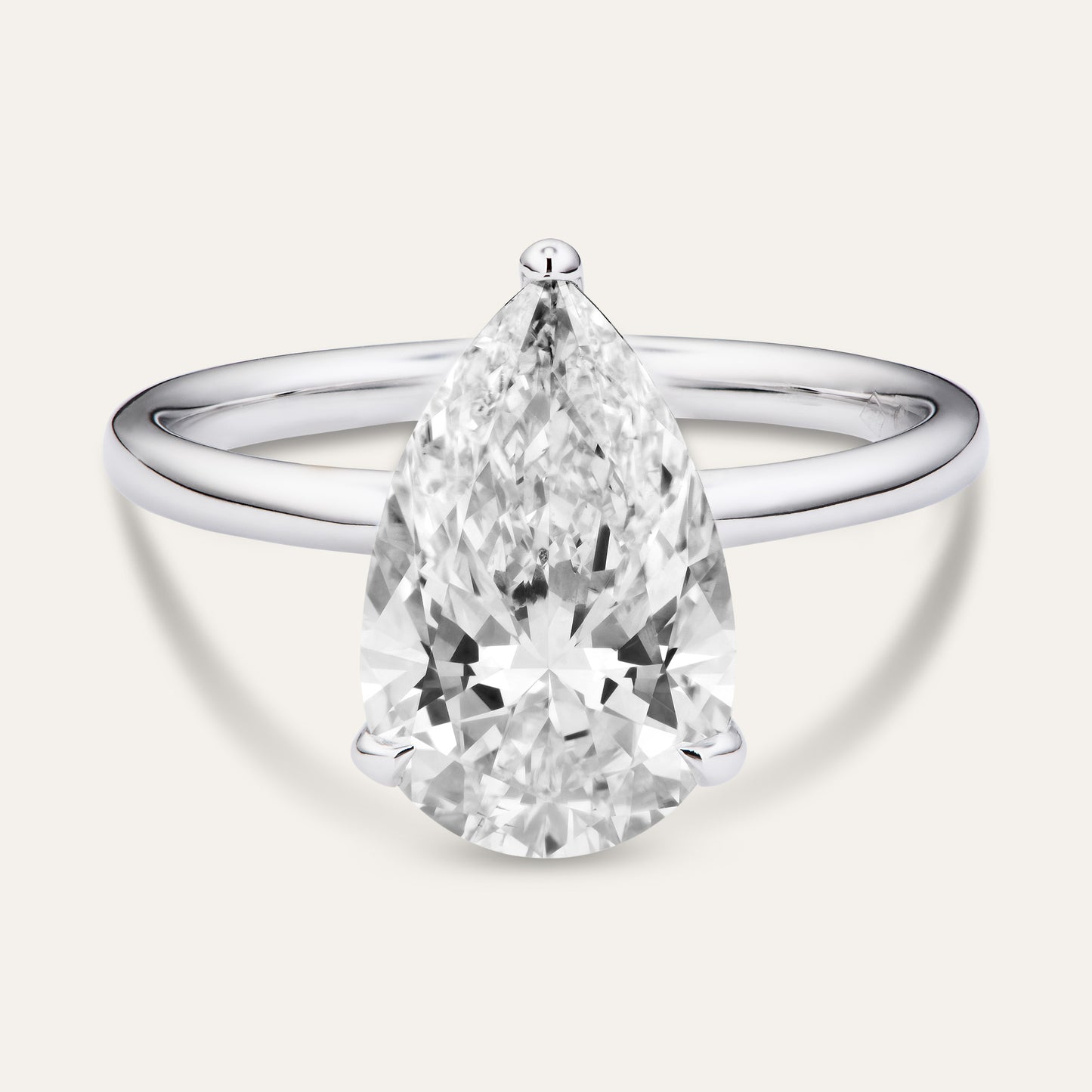 Classic pear-shaped engagement ring with hidden halo (3.52ct)