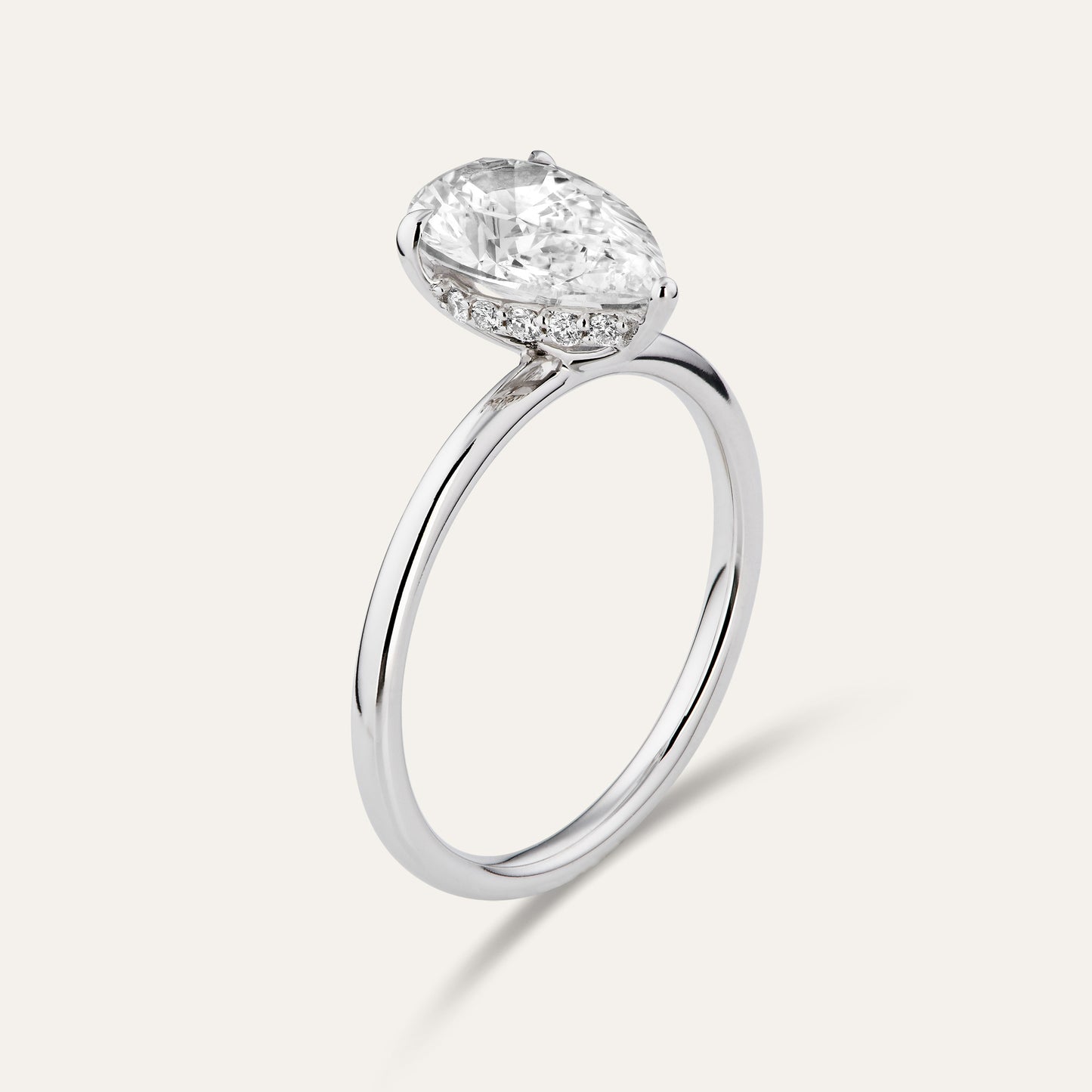 Classic pear-shaped engagement ring with hidden halo (2.01 ct)