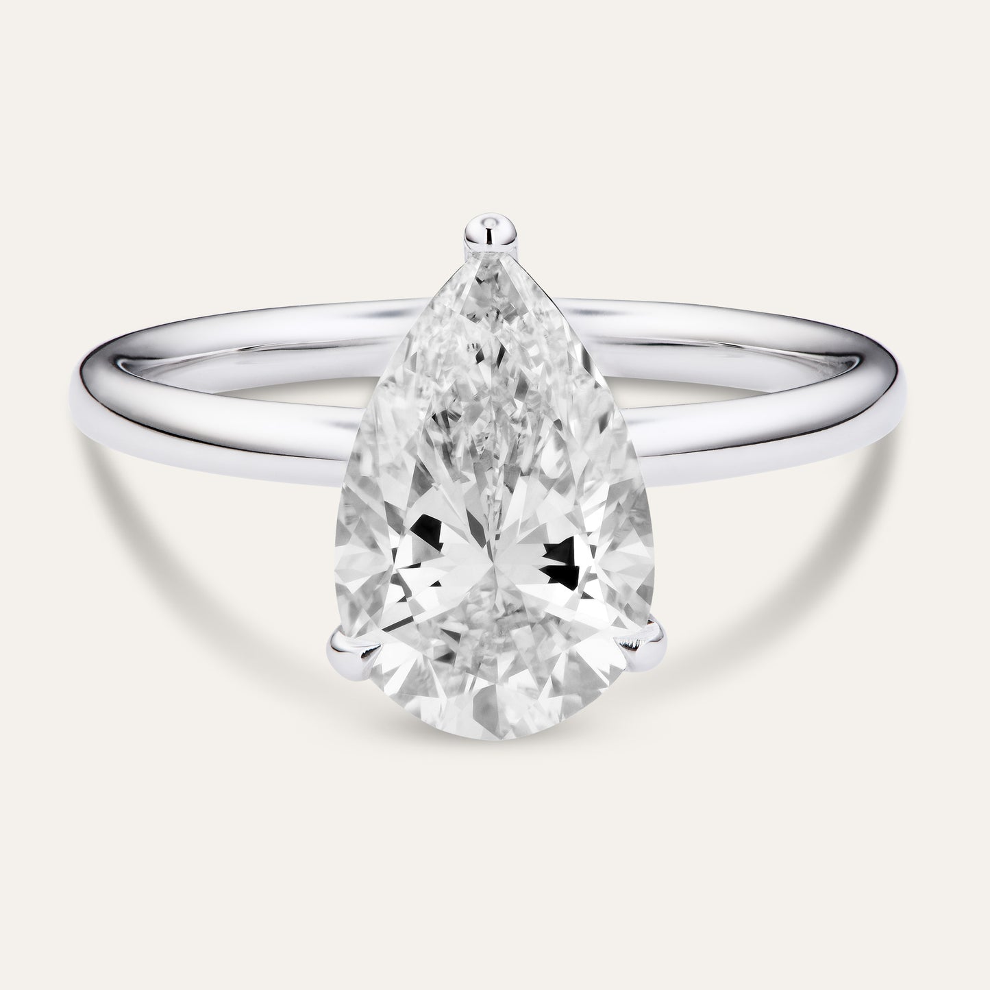 Classic pear-shaped engagement ring with hidden halo (2.59ct)