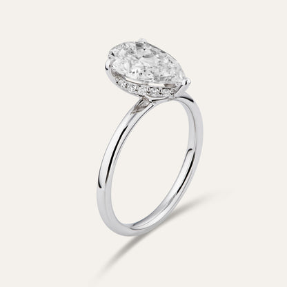 Classic pear-shaped engagement ring with hidden halo (2.59ct)