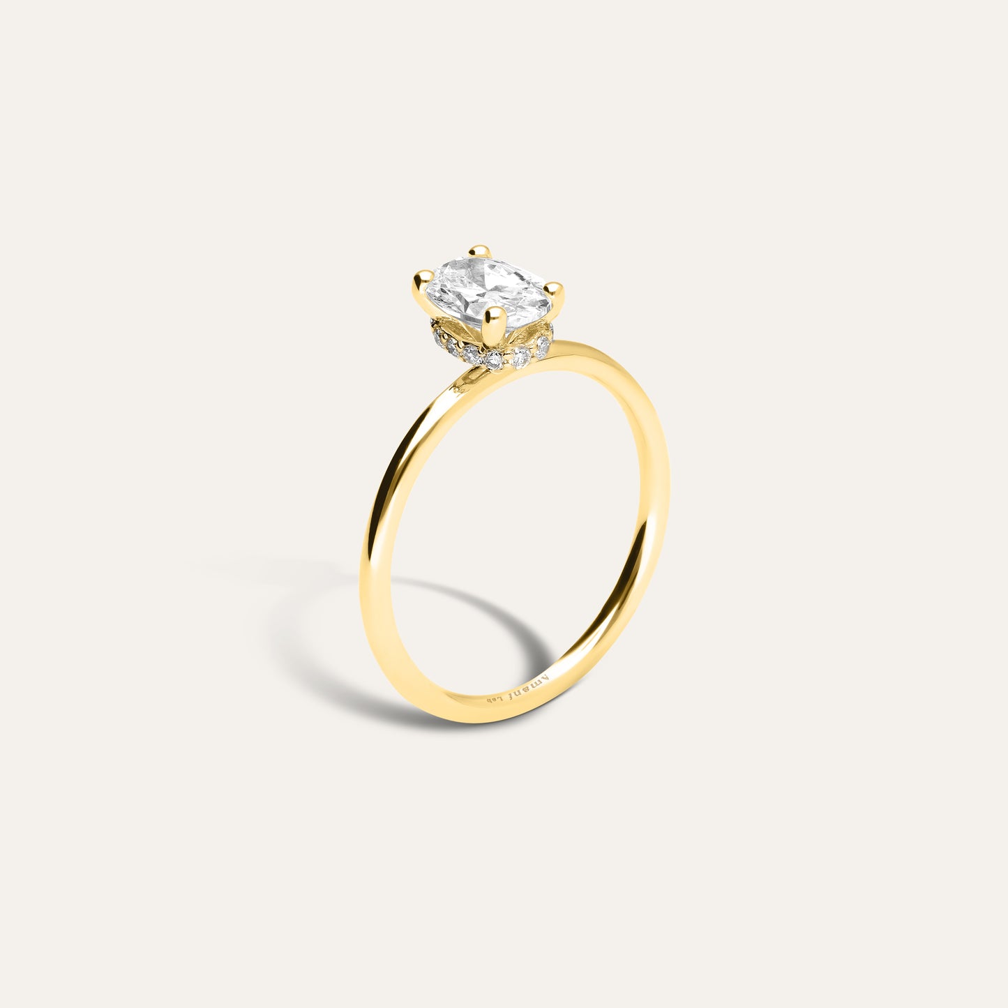 Oval engagement ring with hidden halo (0.90 ct)