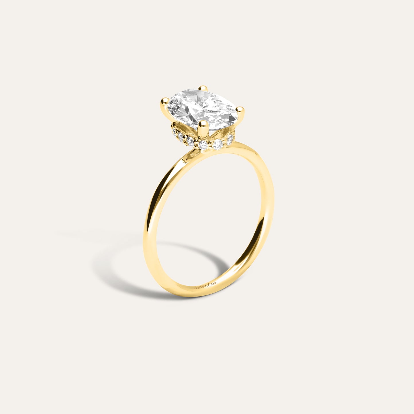 Oval engagement ring with hidden halo (2.24 ct)