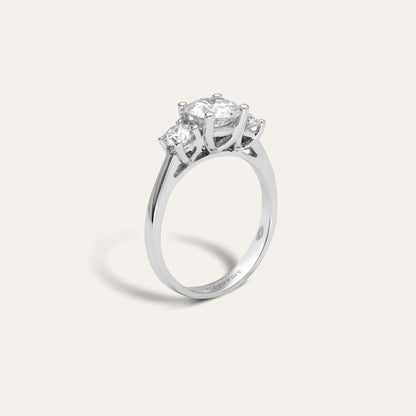 Classic trilogy engagement ring (1.31 ct center & 0.5 ct tot sides)